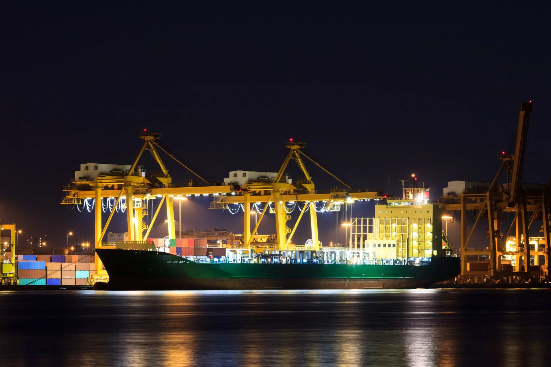 Dubai port at night, subject of our customs and shipping blog